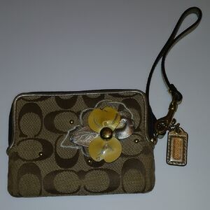 Coach Brown Wristlet with Yellow Flower Accent